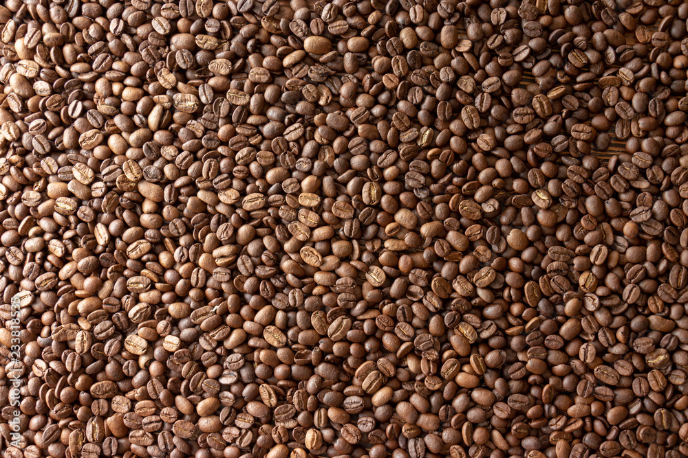 Coffee beans on the table background blurred abstract blurred Coffee beans on the table background blurred abstract blurred