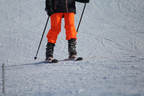 A ski athlete arrives at the end of the descent photo