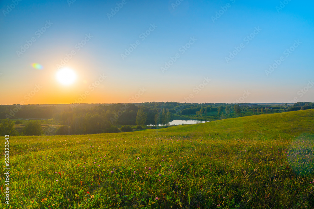 Sunset and summer landscape