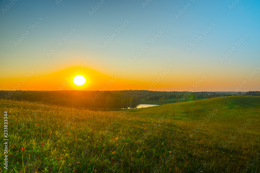 Sunset and summer landscape