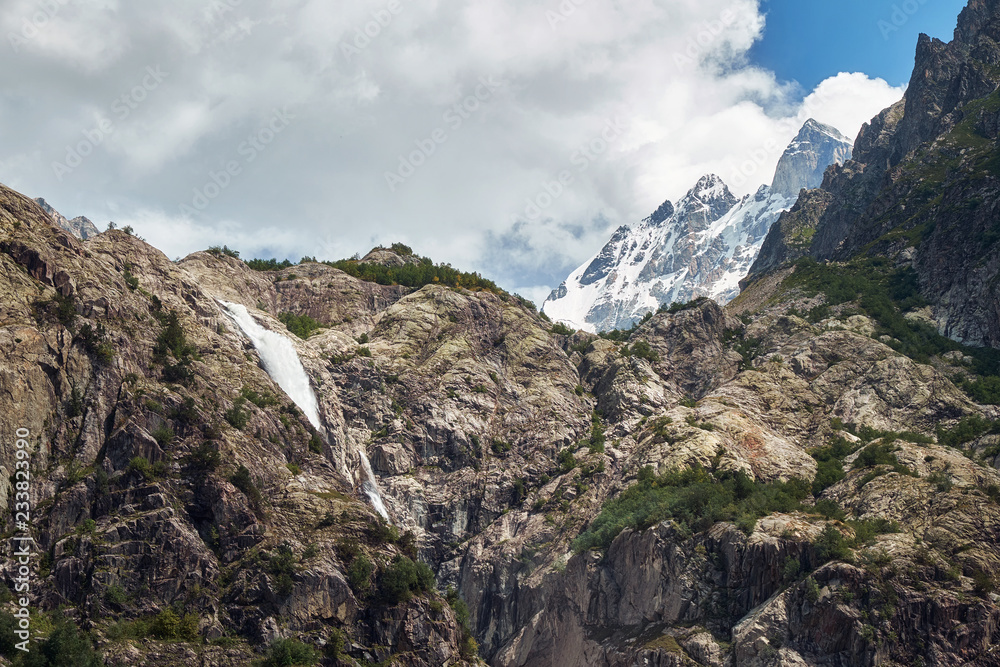 Small mountain waterfall Georgia Svaneti and Ushba summit