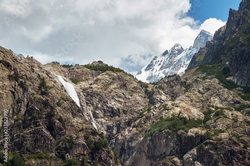 Small mountain waterfall Georgia Svaneti and Ushba summit © Margarita