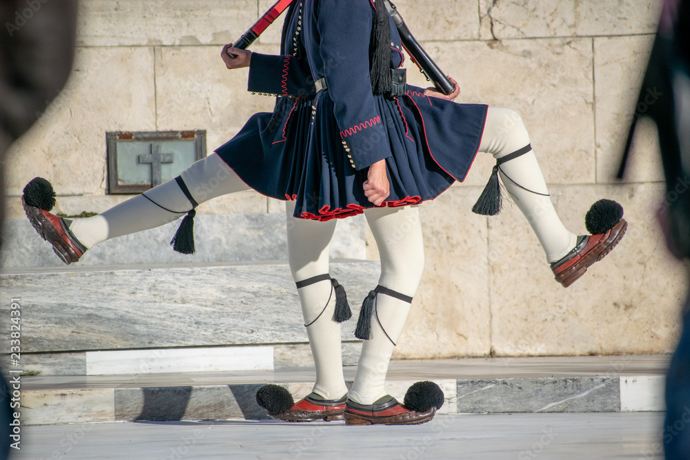 Presidential guards guard the Tomb of Unknown Soldier at Syntagma square. Presidential guards guard the Tomb of Unknown Soldier at Syntagma square.
