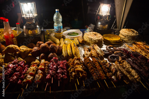 Zanzibari night street food market in Forodhani Gardens. Stone Town, Zanzibar City, Unguja island, Tanzania