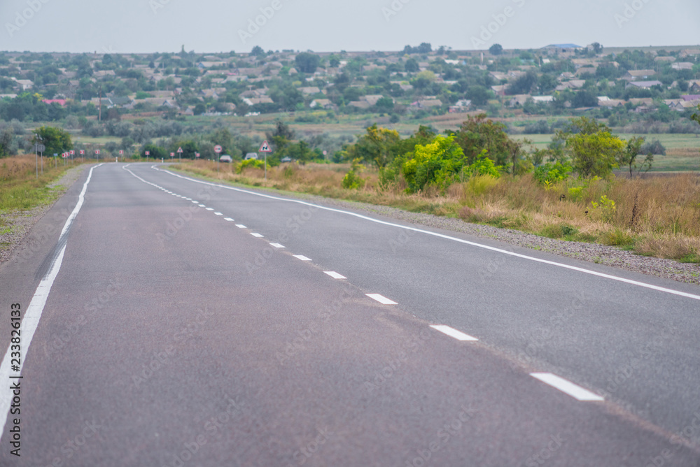Fototapeta premium Asphalt road with road markings