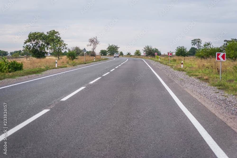 Fototapeta premium Asphalt road with road markings
