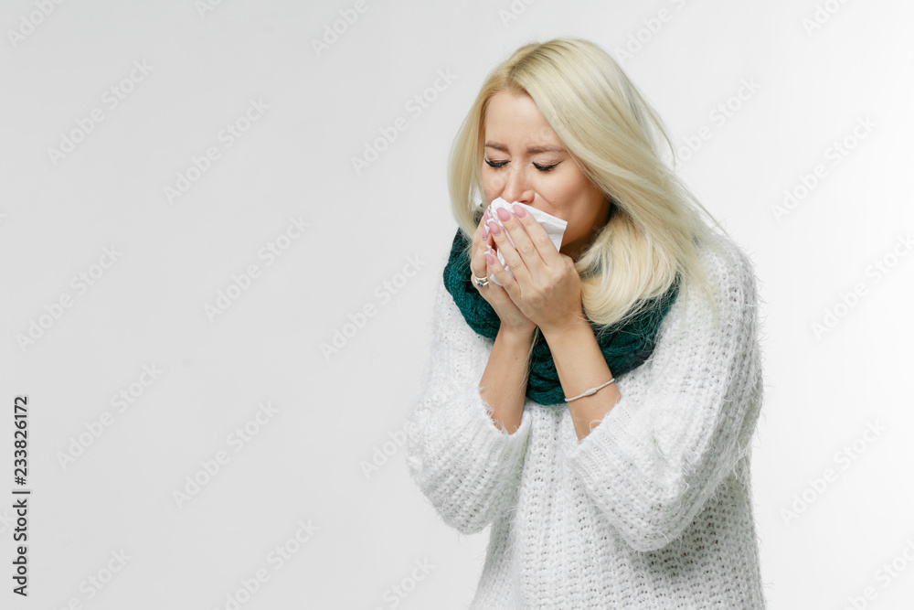 Closeup portrait of unhealthy young European blonde woman coughing a lot, suffering with cough, has a chest pain/ Sick desperate female has flu/Cold, sickness, bronchitis concept/Fit of coughing Closeup portrait of unhealthy young European blonde woman coughing a lot, suffering with cough, has a chest pain/ Sick desperate female has flu/Cold, sickness, bronchitis concept/Fit of coughing