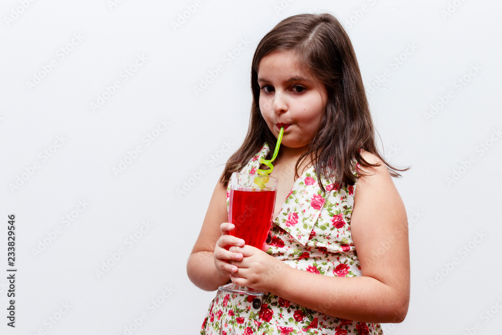 girl drinking gooseberry refreshment with fun straw, white background girl drinking gooseberry refreshment with fun straw, white background