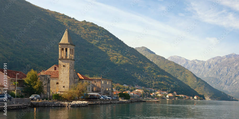 Beautiful Mediterranean landscape. Montenegro, Adriatic Sea, Bay of Kotor.  View of ancient town of Stoliv and Name of Mary Church