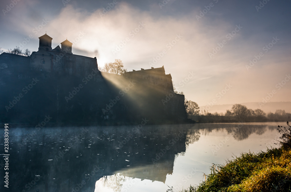 Krakow, Poland, abbey in Tyniec misty sunrise over Vistula river