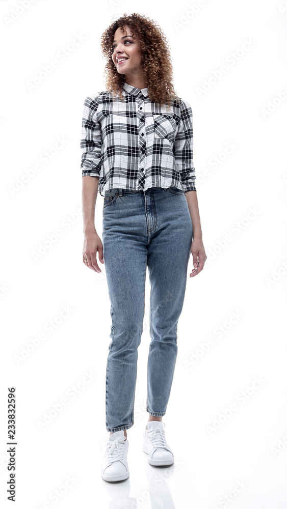stylish young woman in plaid shirt and jeans. stylish young woman in plaid shirt and jeans.