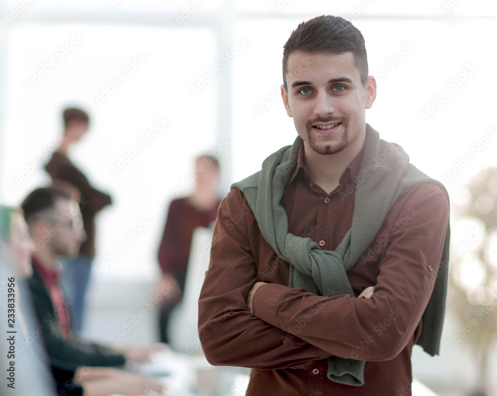 creative businessman on background of office creative businessman on background of office