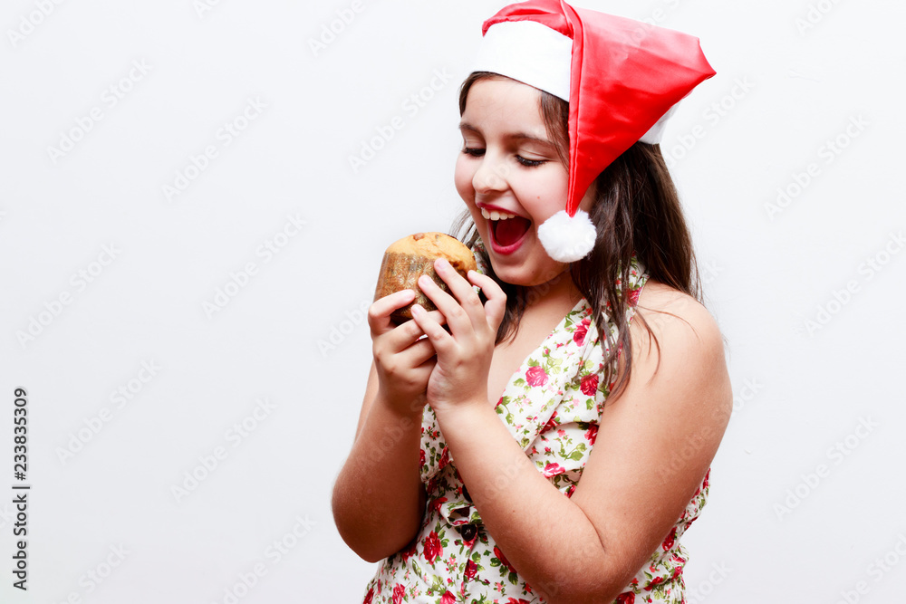 portrait of girl with small panetone, white background