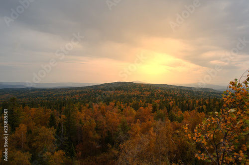 sunset in the mountains in the autumn forest © евгений ставников