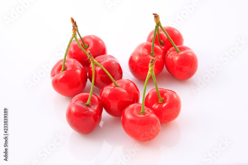 Mature large American cherry on a white background