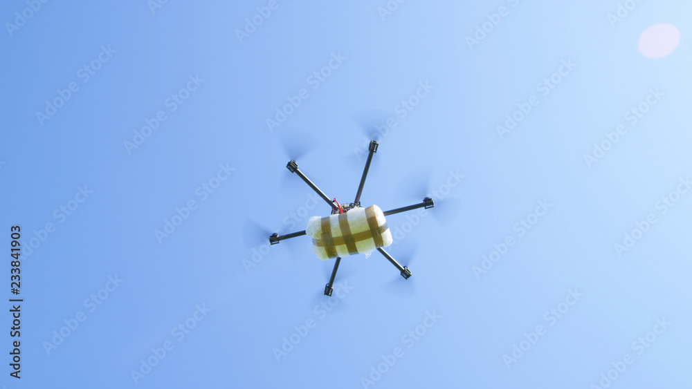 UAV drone flying with big drug stash, smuggling drug package across the border UAV drone flying with big drug stash, smuggling drug package across the border