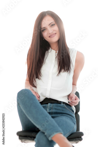 young successful woman sitting in a chair