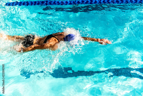 Female swimmer in a lap pool.