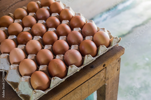 Top view of eggs in the paper package with soft focus background