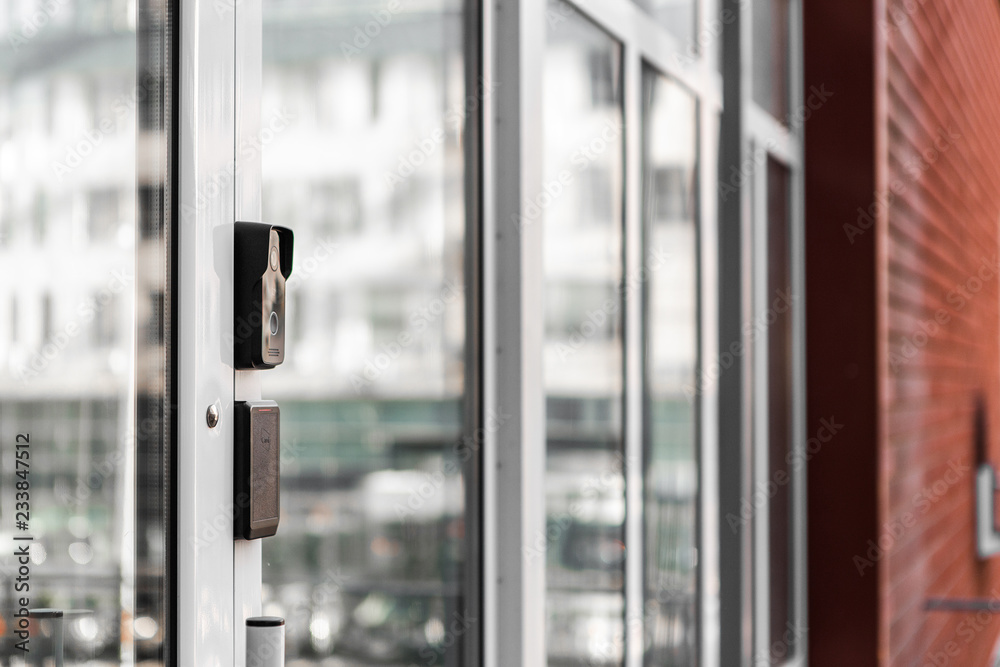 Security technologies, security systems, electronic keys, motion sensors. Hands open the door Security technologies, security systems, electronic keys, motion sensors. Hands open the door