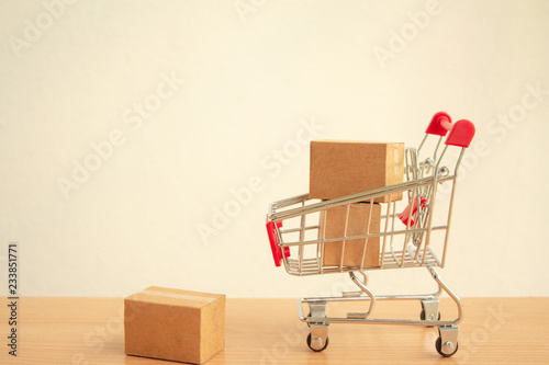 Parcel box in a trolley or shopping cart with ,E-commerce concept,delivery service concept.