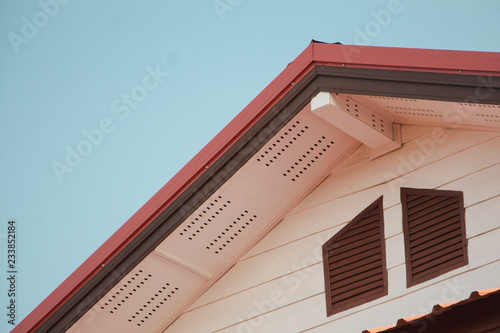 House roof and ceiling,with blue sky,   ventilation on a house.