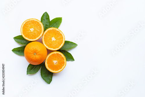 Fresh orange citrus fruit with leaves isolated on white background.  Top view, Copy space