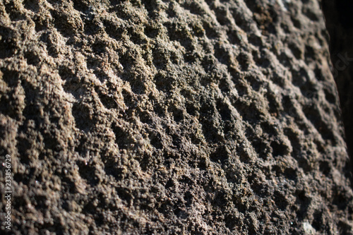 Pitted sandstone textured background