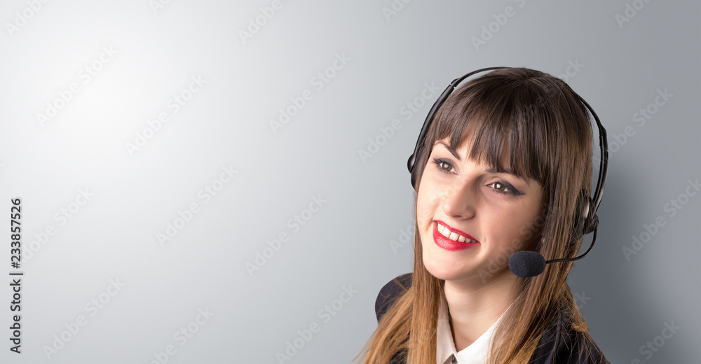 Young female telemarketer on a white background Young female telemarketer on a white background