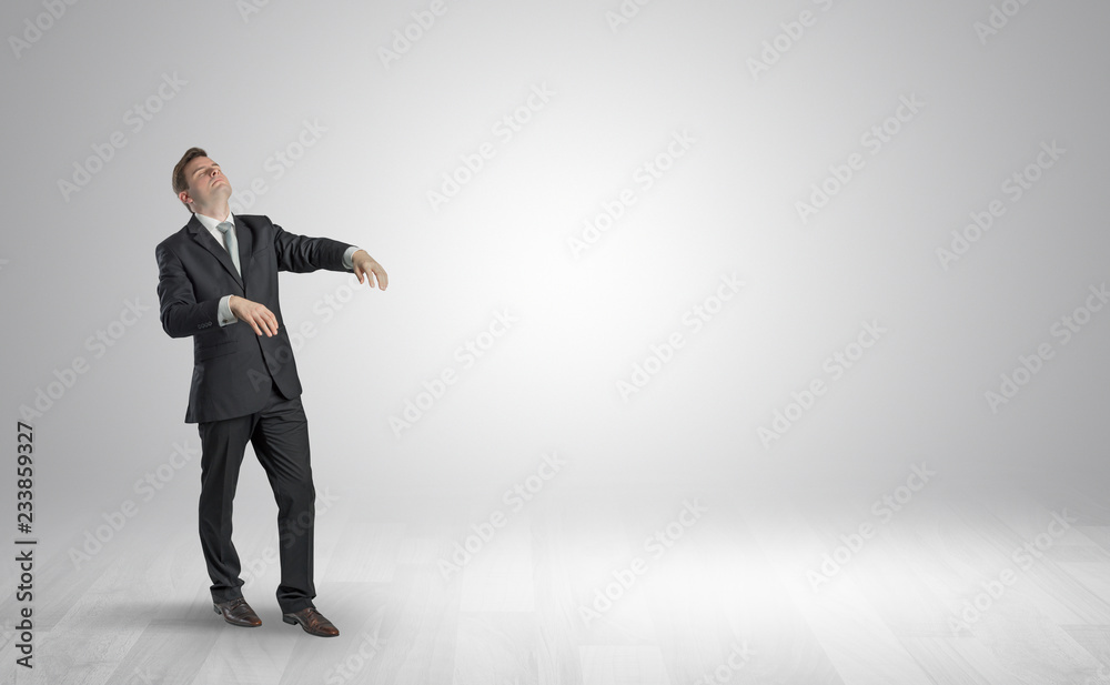 Zombi, sleepy maniac businessman walking in a copy space
Zombi, sleepy maniac businessman walking in a copy space