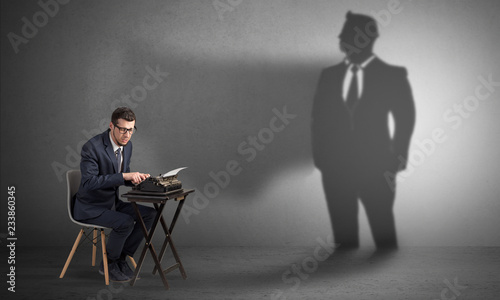 Shadow threatening hard worker man who is afraid   © ra2 studio