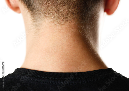 The man's neck from behind. Nape. Close up. Isolated on white background