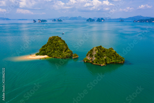Fototapeta Naklejka Na Ścianę i Meble -  Aerial drone view of a small, beautiful tropical island with sandy beach (Ko Nok, Thailand)