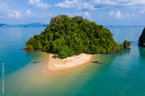 Aerial drone view of a beautiful tropical sandy beach and island near Koh Yao Noi, Thailand photo