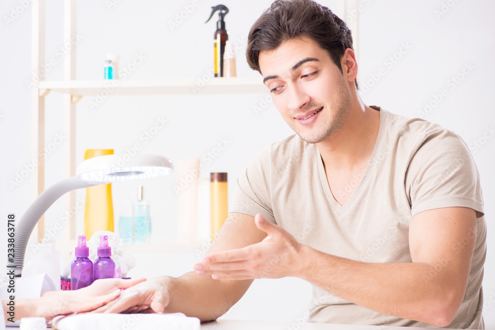 Hands during manicure care session Hands during manicure care session