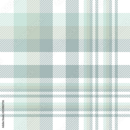 Plaid pattern in shades of faded green and white.