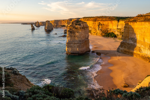 The rock stacks that comprise the Twelve Apostles at sunset in Port Campbell National Park. Great Ocean Road, Victoria State, Australia.