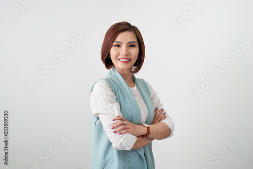 Fotografie Entrepreneur young asian woman, business woman arms crossed on white background
