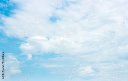 Beautiful blue azure sky with white clouds on sunny day, background, copy space for your design or concept