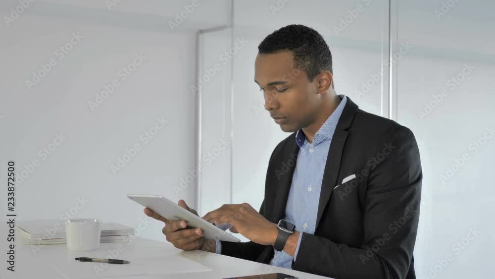 Man Paying Online, Online Shopping with Credit Card on Tablet Man Paying Online, Online Shopping with Credit Card on Tablet