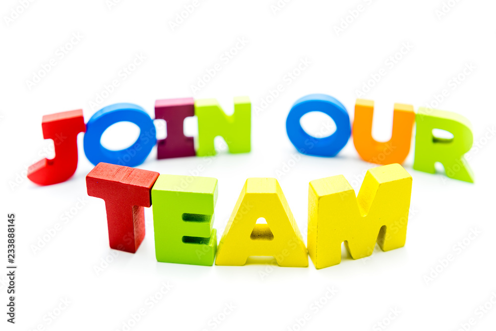 Join Our Team text written with colourful wooden letters, isolated over white with copy space Join Our Team text written with colourful wooden letters, isolated over white with copy space
