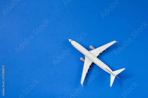Image of airplane isolated on empty blue background