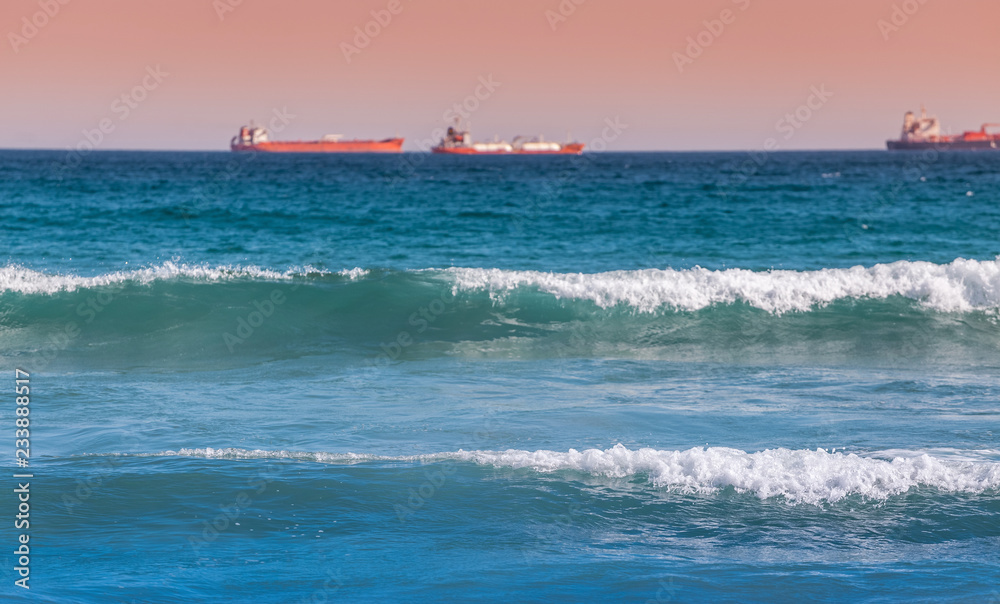 Cargo ship sailing in to the sea