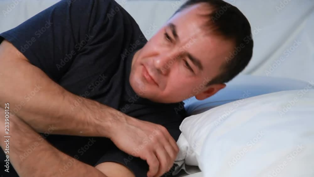 Man wakes up and brushes her teeth