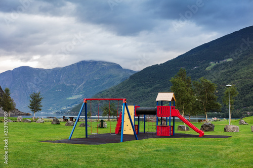 playground in the park on the shore of the fjord