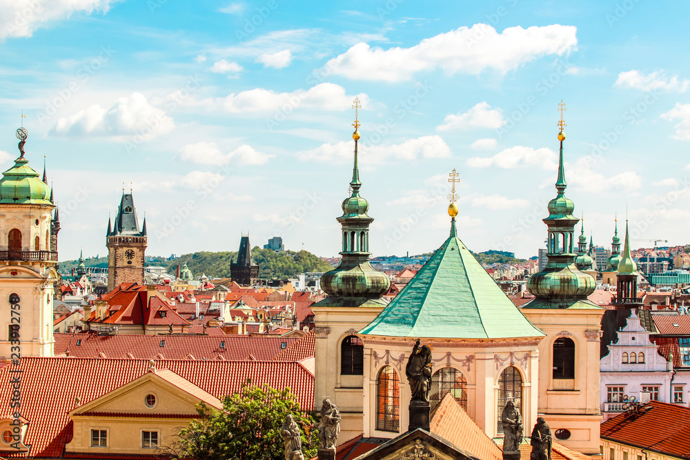 Prague, Bohemia, Czech Republic. Cityscape of Praha with dome, houses, churches, tower. Prague, Bohemia, Czech Republic. Cityscape of Praha with dome, houses, churches, tower.