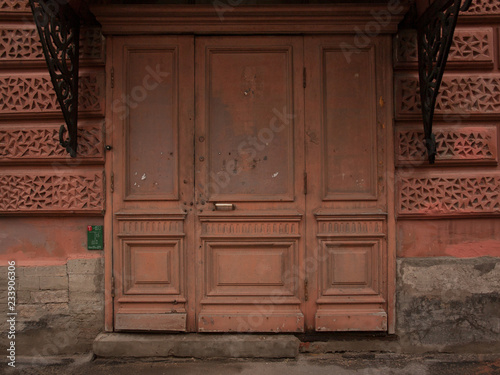 door in old wooden house © Sergey