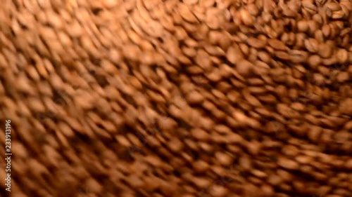 coffee grains rotate in a roaster, coffee roasting