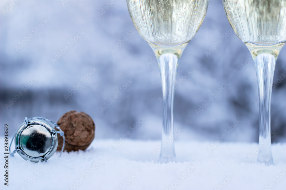 glass of champagne on on winter background glass of champagne on on winter background