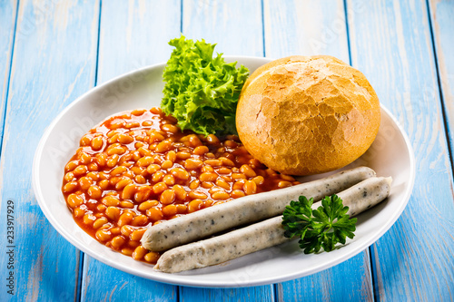 English breakfast - bun,sausages and beans photo